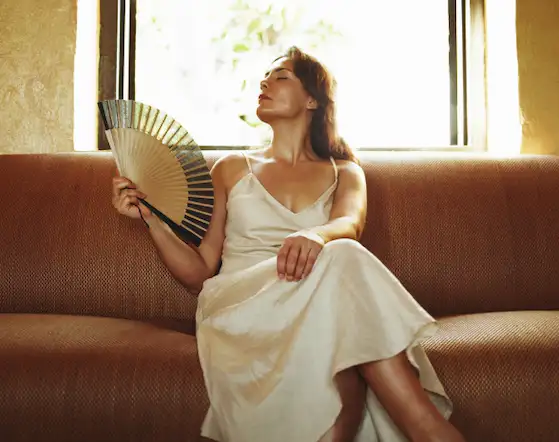 woman fanning herself